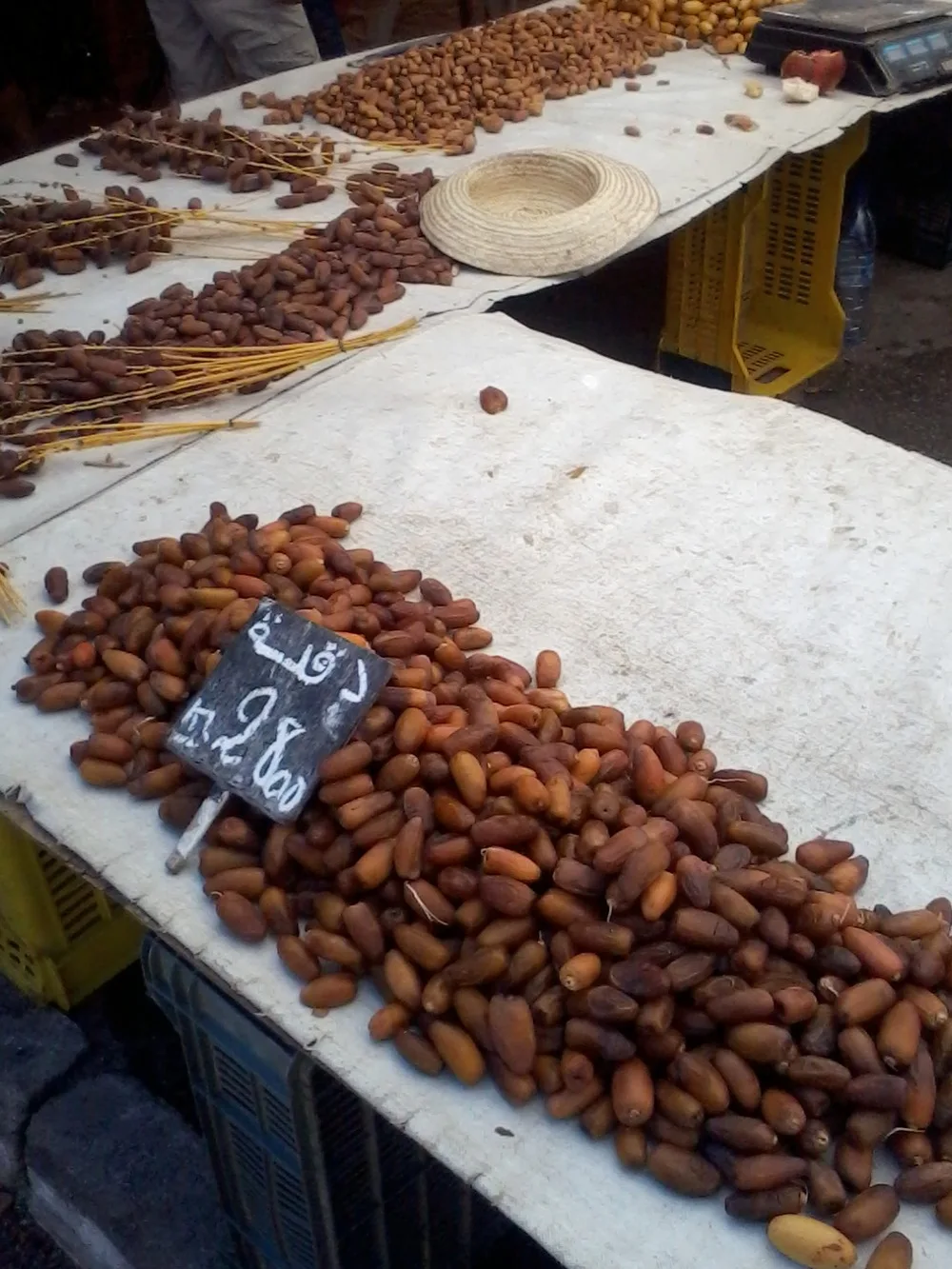 Bulk dates in warehouse crates ready to ship to Bogor